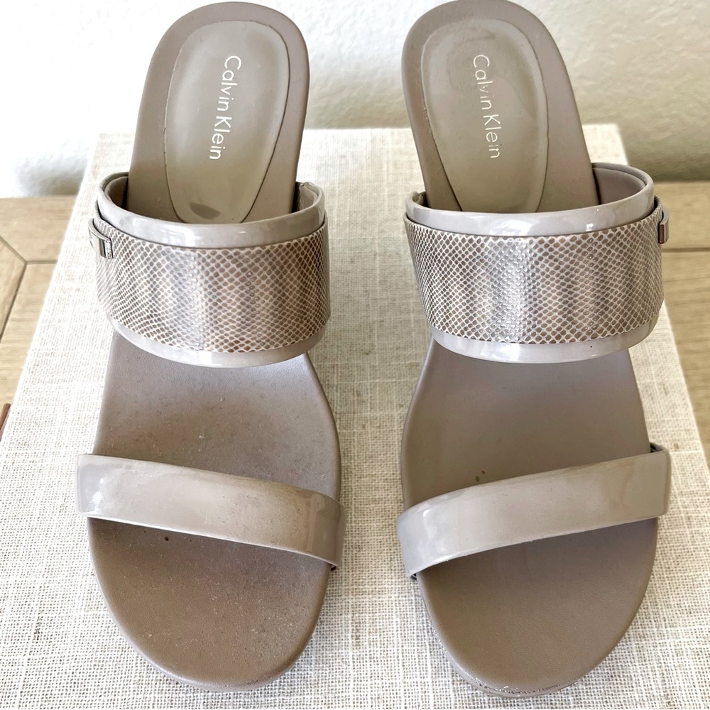 Calvin Klein, grey wedges.  Size 8.5 Medium.  Has a 4 inch wedge.